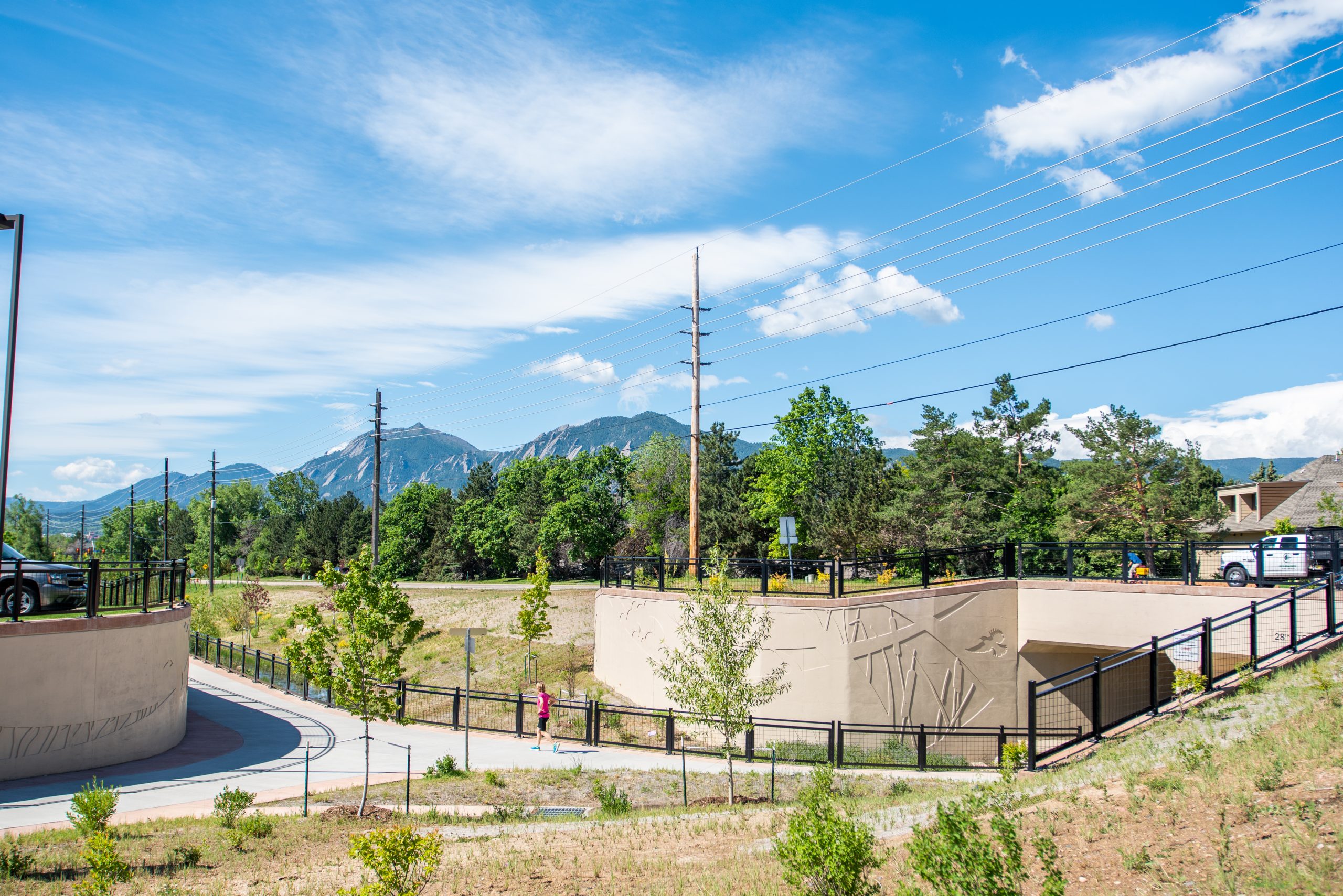 Adult running on Wonderland Creek Running Path