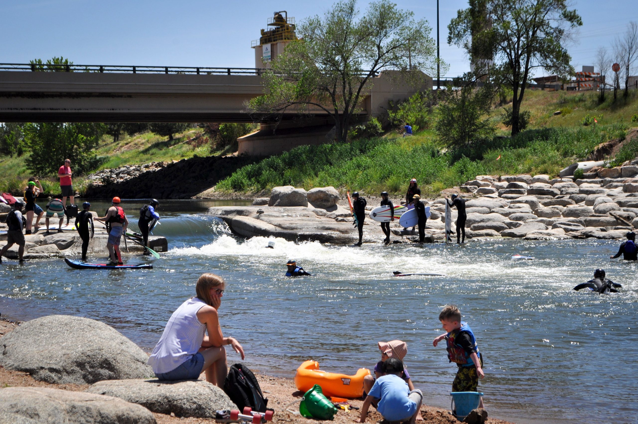 Families Enjoying Public River Surf Park